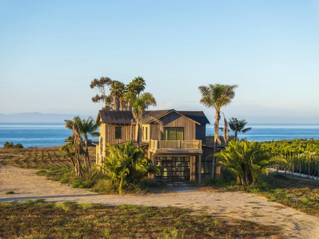 a view of a water with mountains in the background