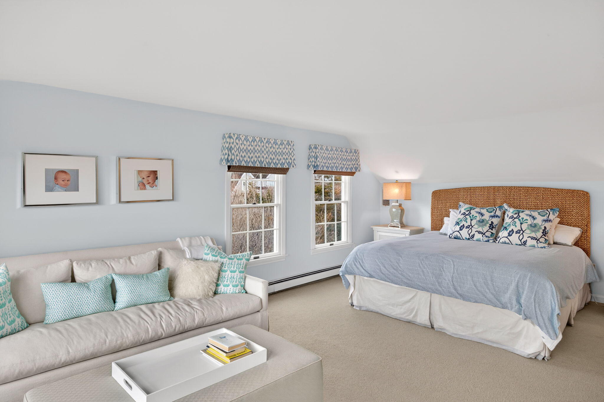 346 Morris Island Road Chatham, MA 02633 - Photo 22 of 33 a bedroom with a bed and a couch with window