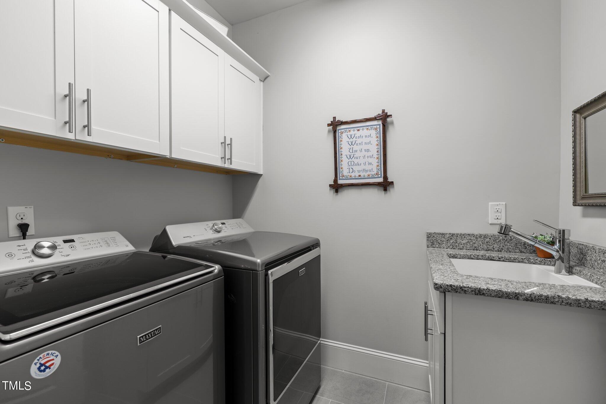 504 Valleyshire Road Durham, NC 27707 - Photo 18 of 38 a utility room with dryer and washer