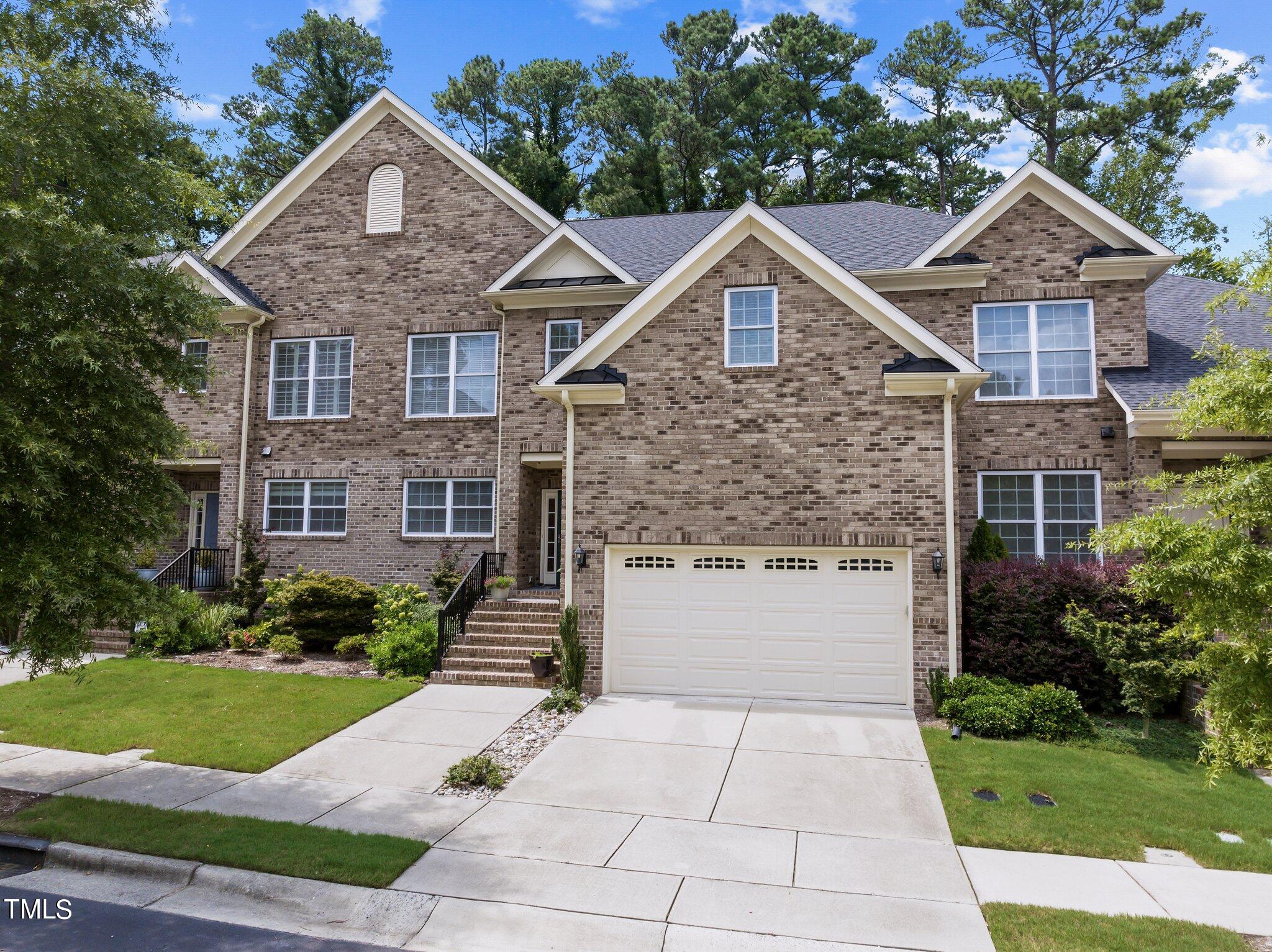 504 Valleyshire Road Durham, NC 27707 - Photo 2 of 38 a front view of a house with a yard