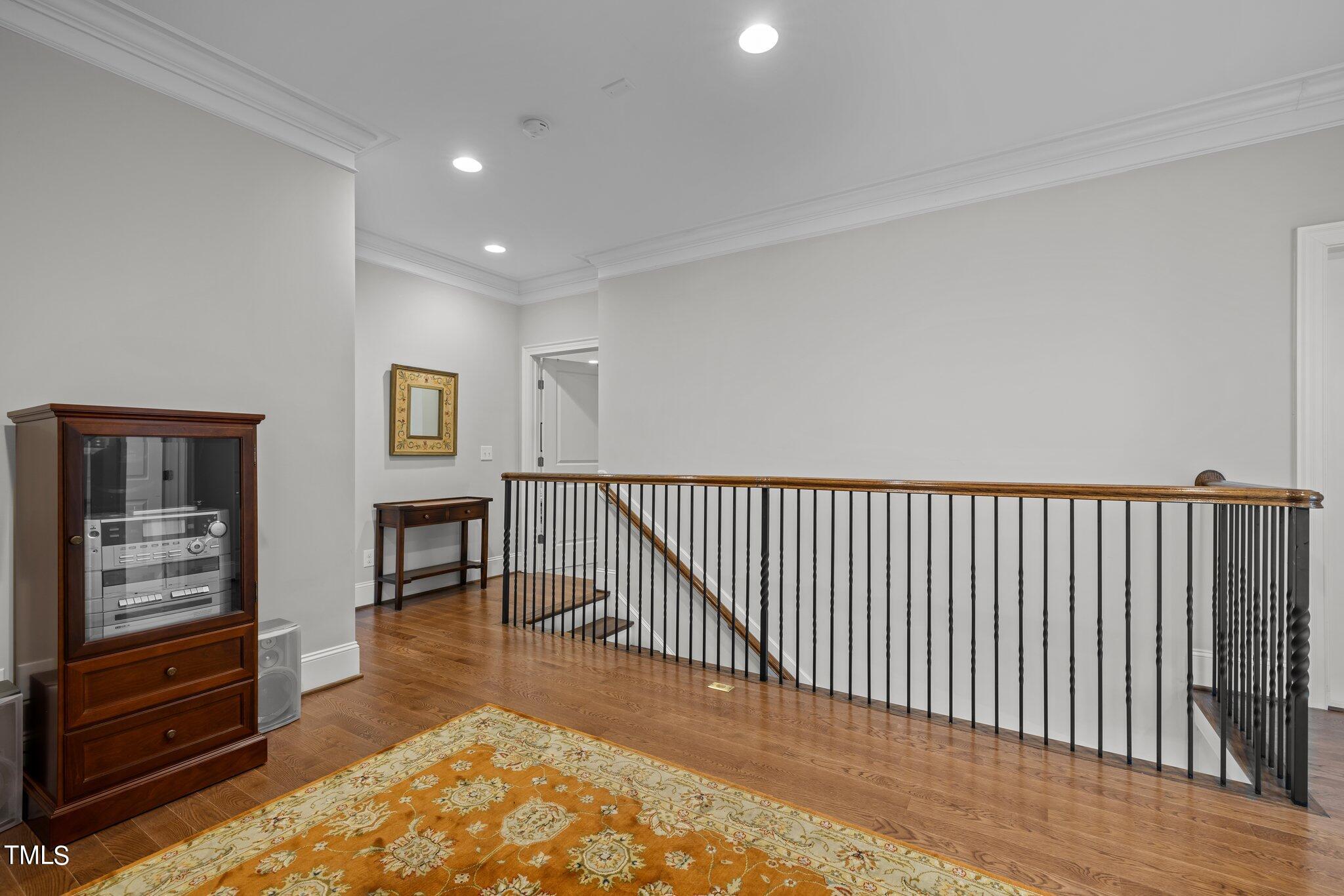 504 Valleyshire Road Durham, NC 27707 - Photo 21 of 38 a view of a hallway with windows