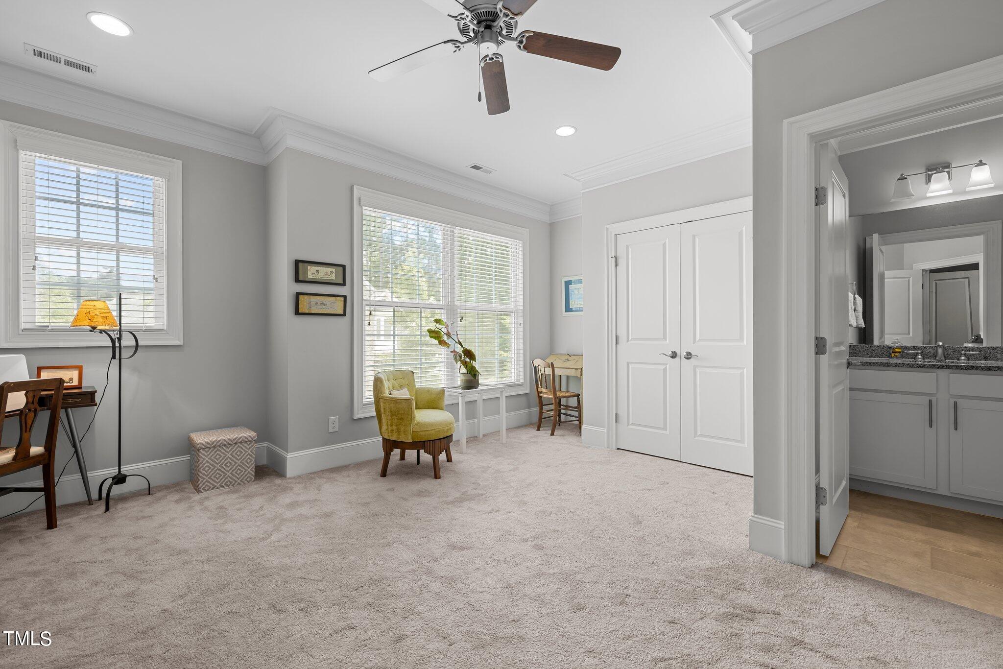 504 Valleyshire Road Durham, NC 27707 - Photo 23 of 38 a living room with furniture and a window
