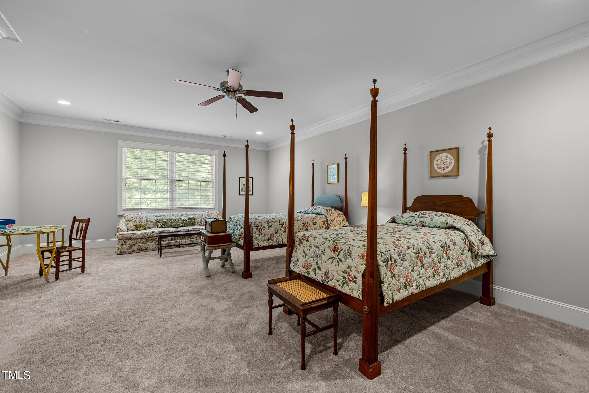 504 Valleyshire Road Durham, NC 27707 - Photo 30 of 38 a bedroom with furniture and a window