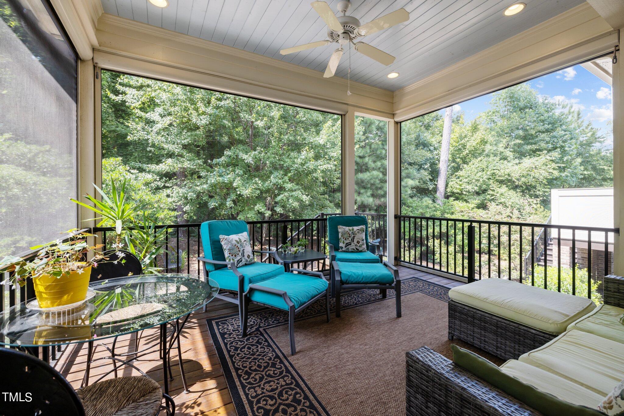 504 Valleyshire Road Durham, NC 27707 - Photo 3 of 38 a living room with furniture and a floor to ceiling window
