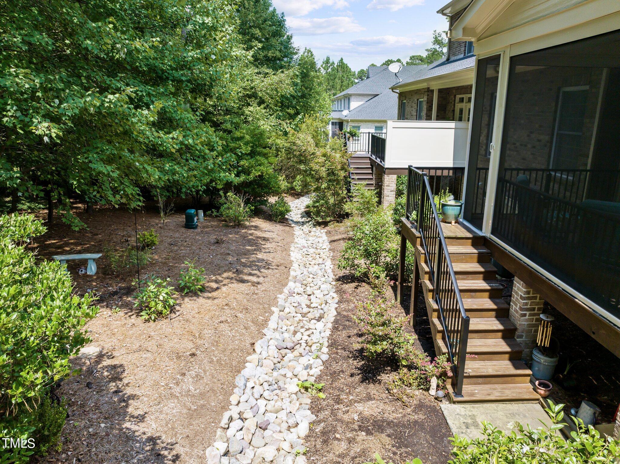504 Valleyshire Road Durham, NC 27707 - Photo 33 of 38 a front view of a house with a yard and seating area