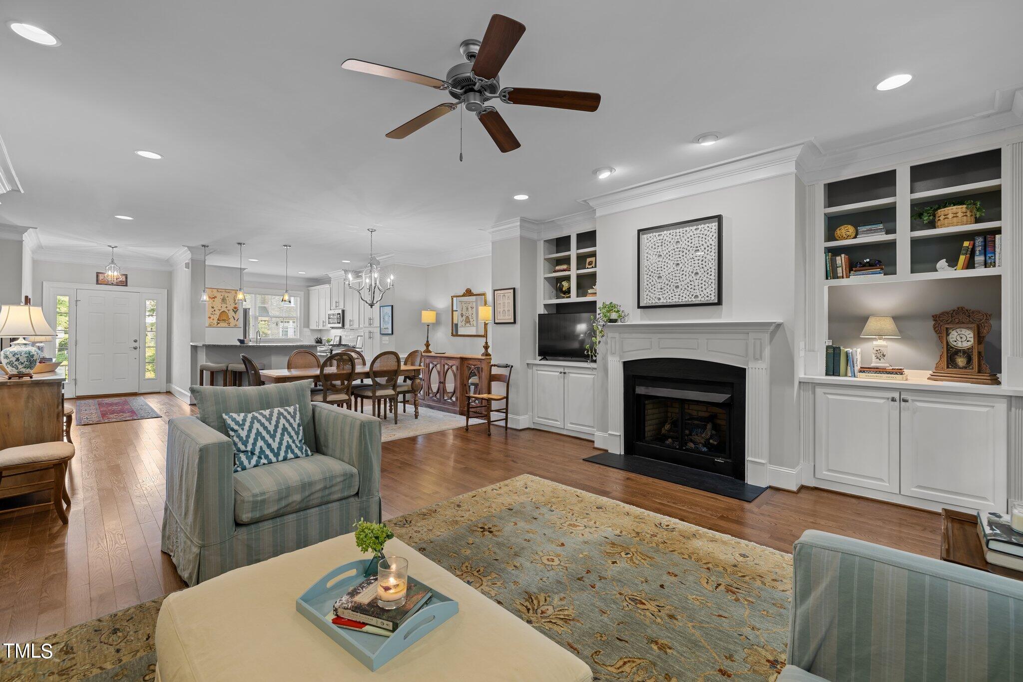 504 Valleyshire Road Durham, NC 27707 - Photo 5 of 38 a living room with furniture and a fireplace
