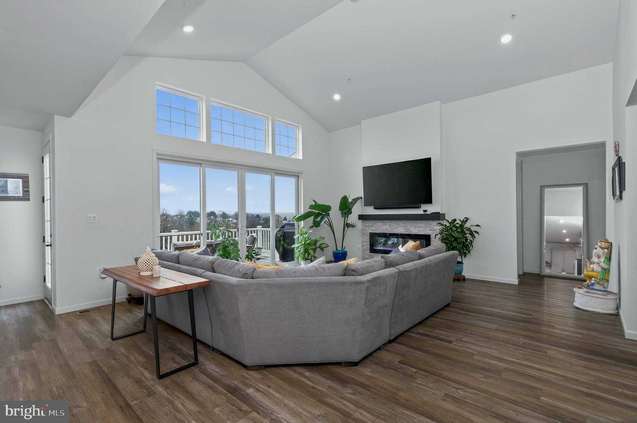 401 Karn Place Brunswick, MD 21716 - Photo 15 of 82 a living room with furniture and a flat screen tv