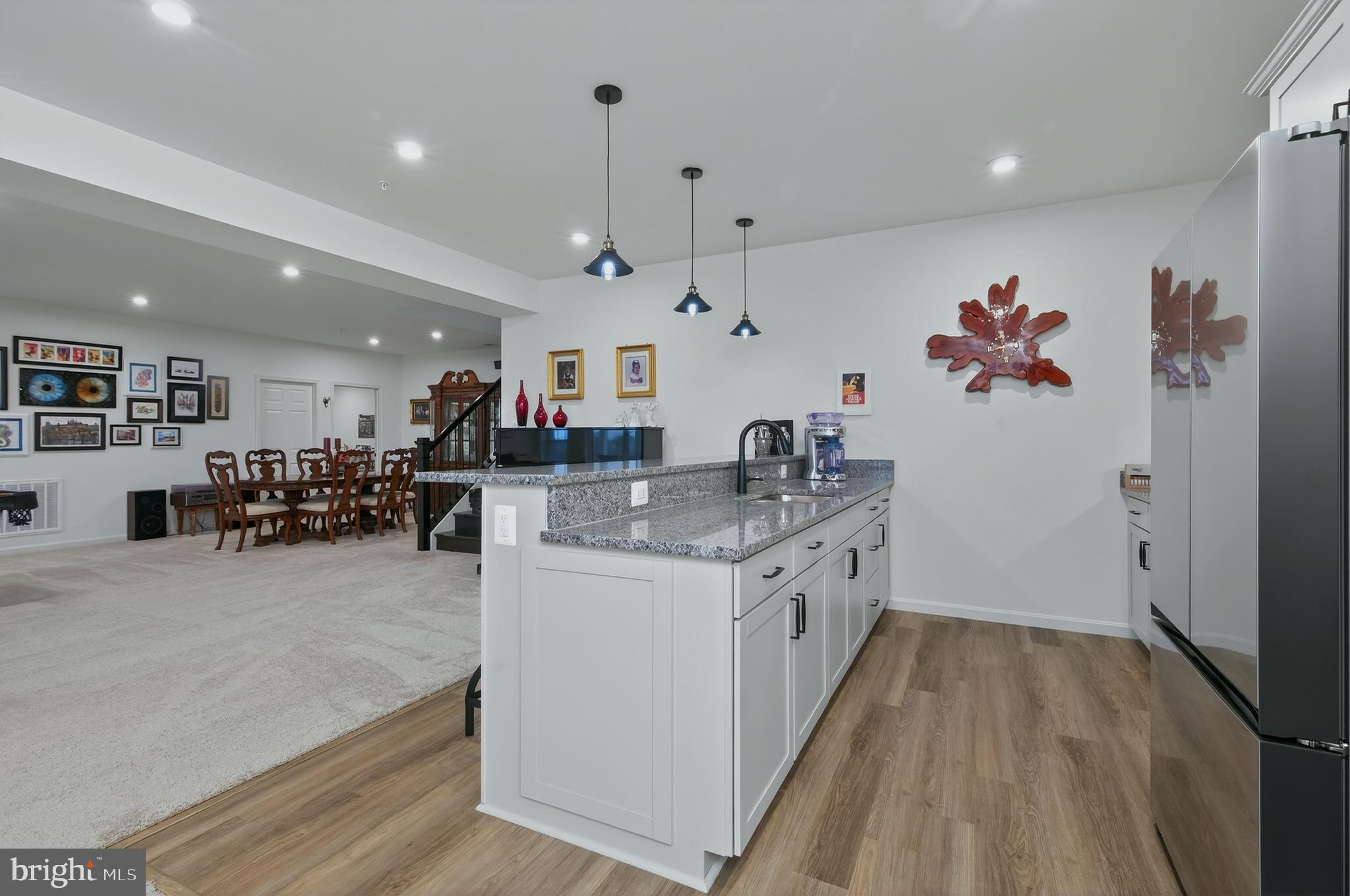 401 Karn Place Brunswick, MD 21716 - Photo 47 of 82 a kitchen with stainless steel appliances granite countertop a stove and refrigerator
