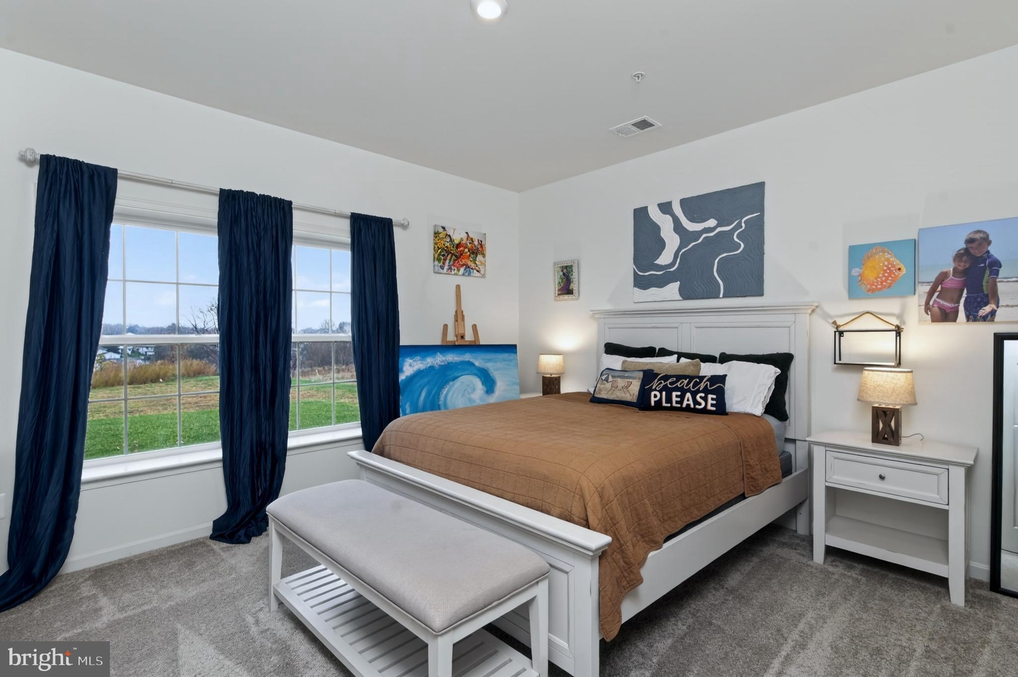401 Karn Place Brunswick, MD 21716 - Photo 54 of 82 a bedroom with a bed and a large window