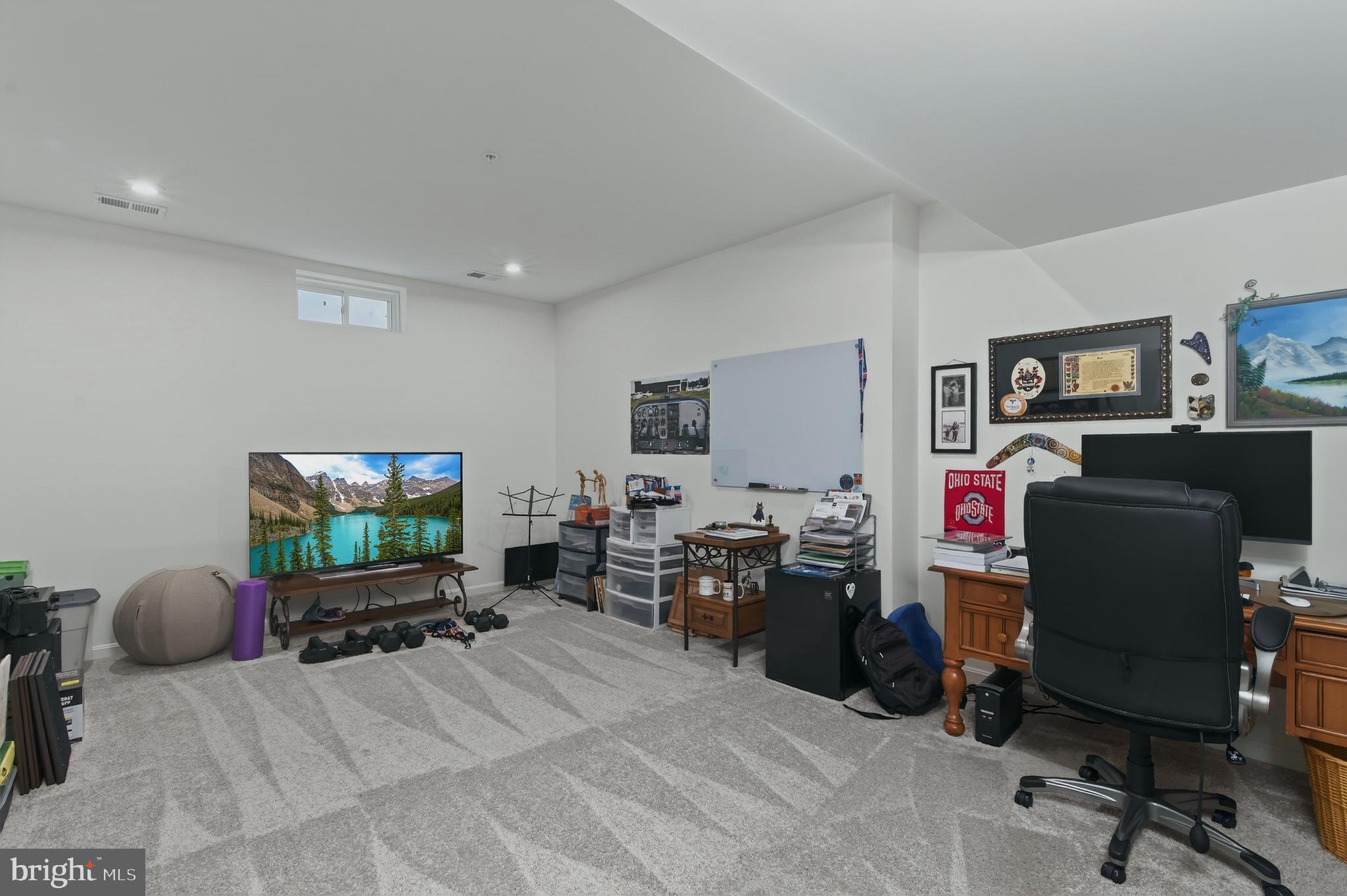 401 Karn Place Brunswick, MD 21716 - Photo 58 of 82 a workspace with furniture and a flat screen tv