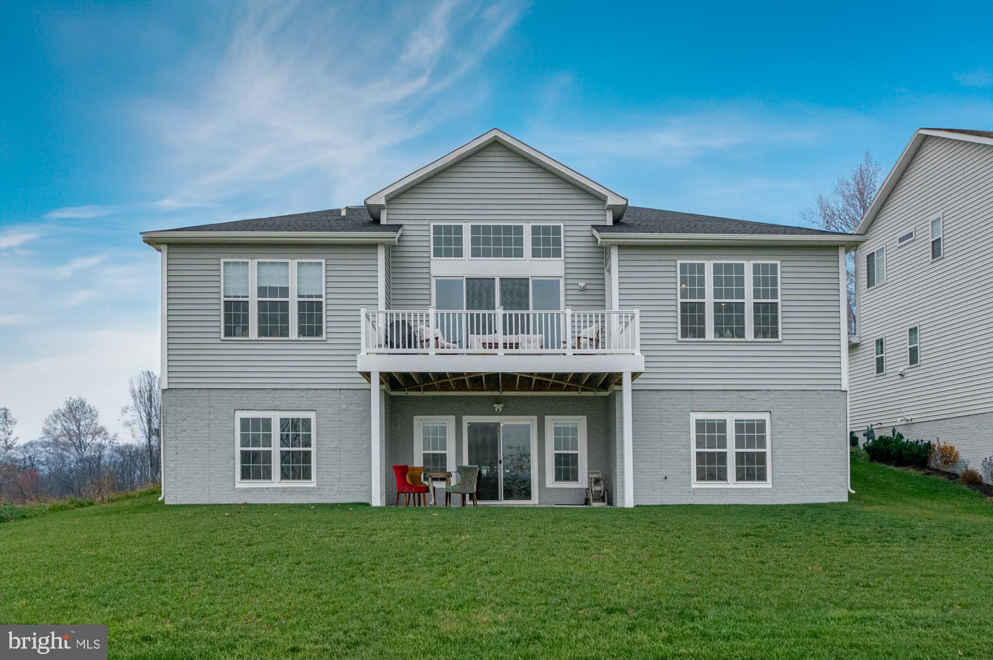 401 Karn Place Brunswick, MD 21716 - Photo 59 of 82 a front view of a house with a yard