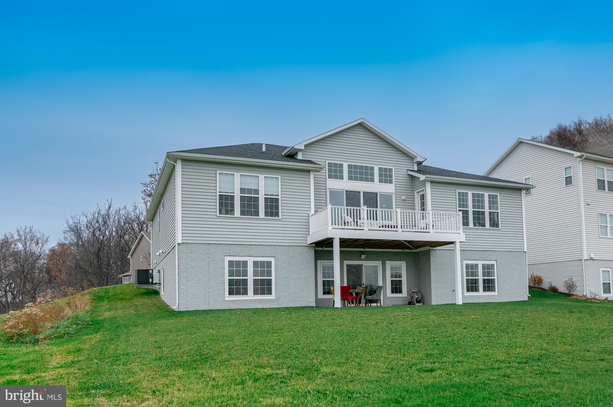 401 Karn Place Brunswick, MD 21716 - Photo 60 of 82 a front view of a house with a garden