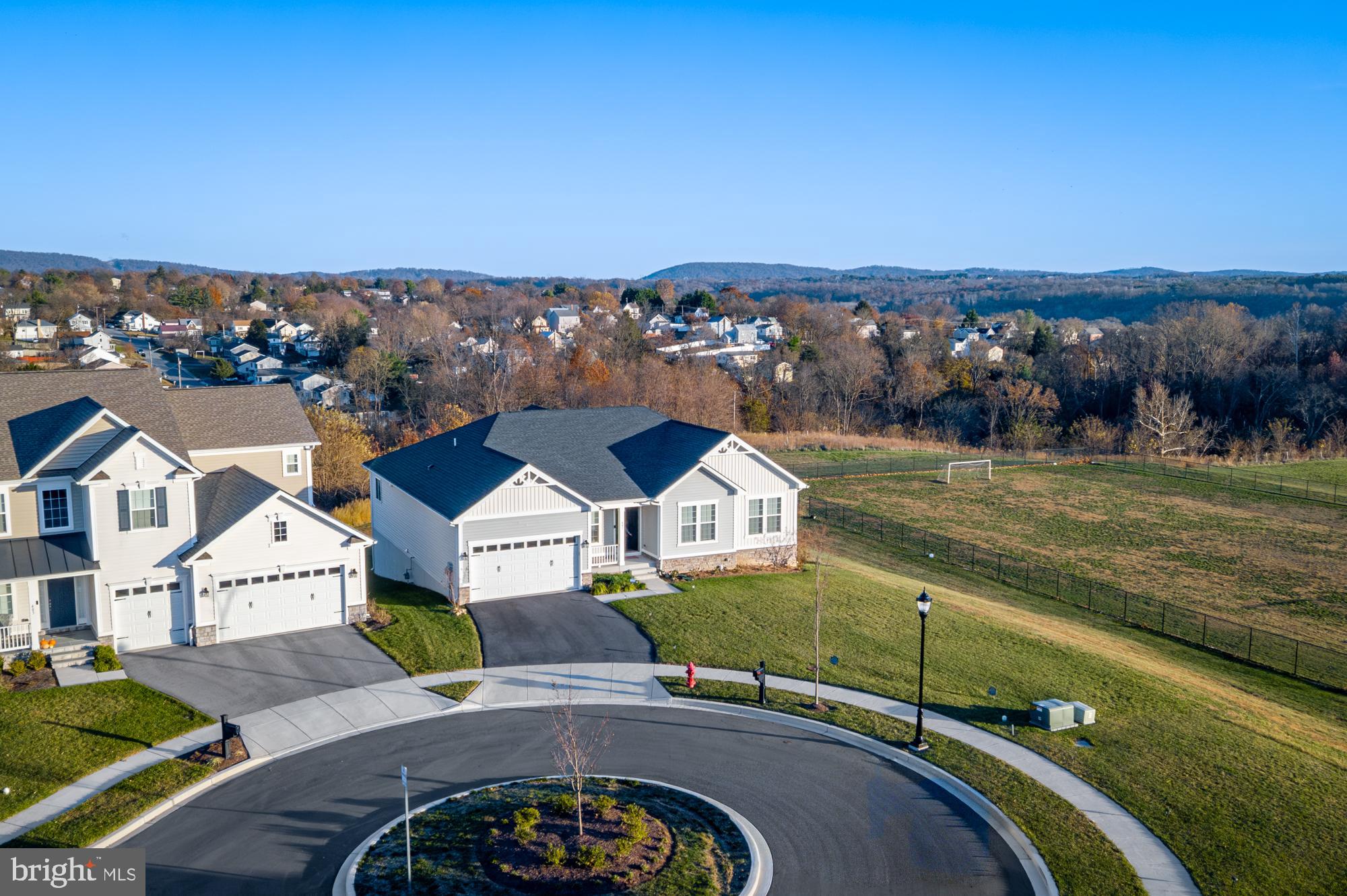401 Karn Place Brunswick, MD 21716 - Photo 62 of 82 an aerial view of residential houses with outdoor space and river