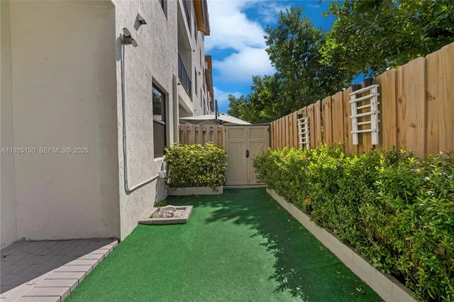 a view of a garden with pathway