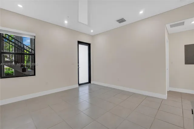 an empty room with windows