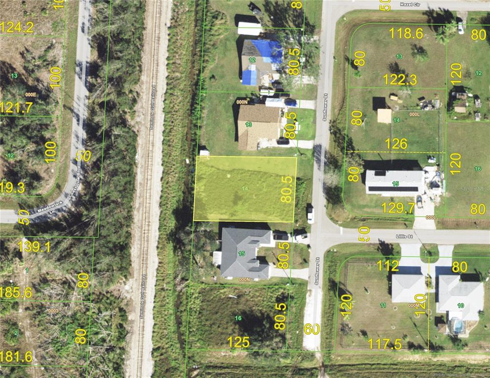 377 Sunflower Street Punta Gorda, FL 33982 - Photo 1 of 1 an aerial view of a house with a yard
