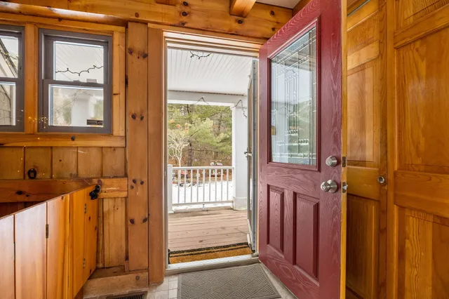 a view of an entryway with a door