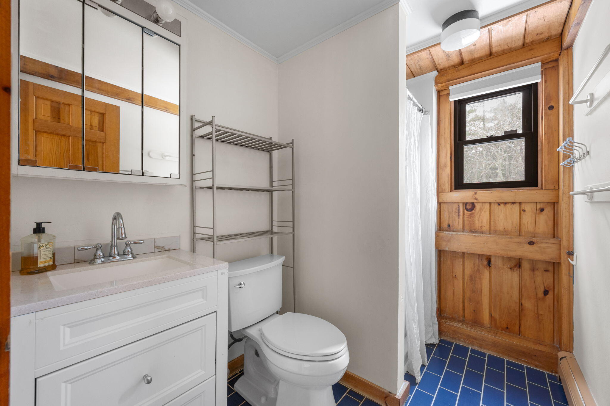 248 Great Neck Road Wareham, MA 02571 - Photo 28 of 54 a bathroom with a toilet sink vanity and mirror
