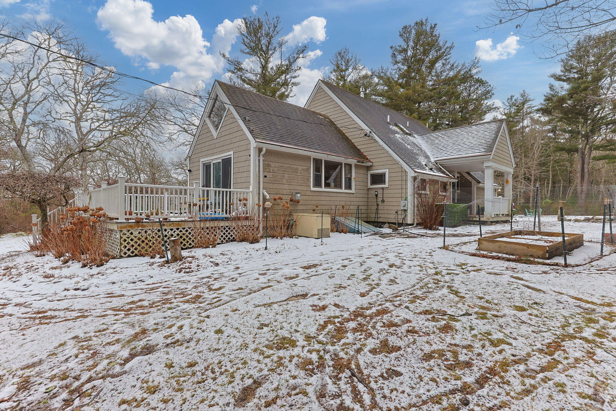248 Great Neck Road Wareham, MA 02571 - Photo 43 of 54 a front view of a house with a yard covered in snow