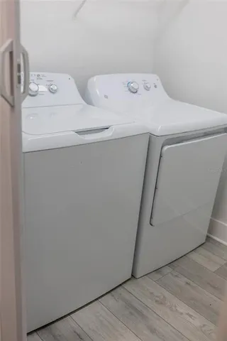 a utility room with dryer and washer