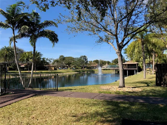 a view of a house with a lake view