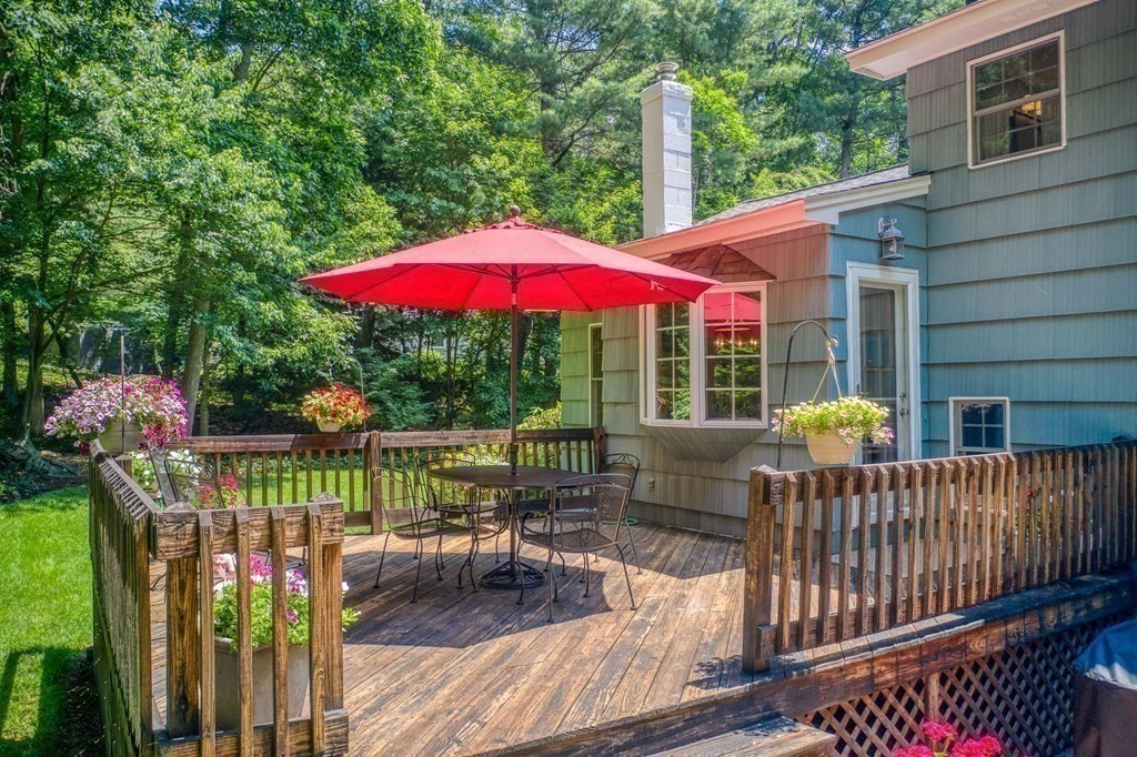 37 Long Meadow Road Chelmsford, MA 01824 - Photo 14 of 30 a view of balcony with outdoor seating and wooden floor
