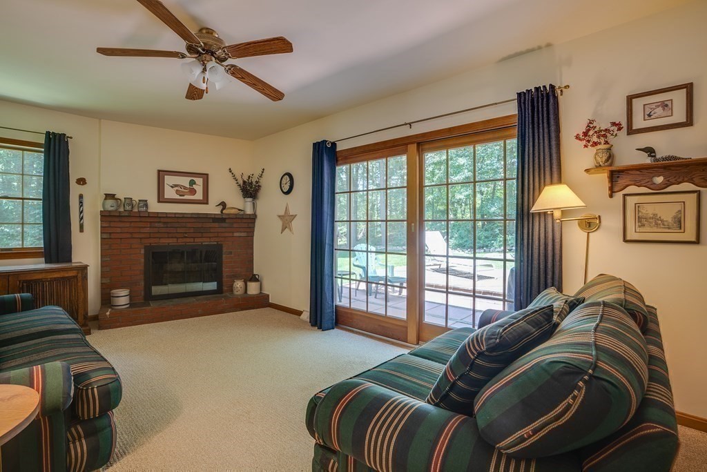 37 Long Meadow Road Chelmsford, MA 01824 - Photo 16 of 30 a living room with furniture and a fireplace