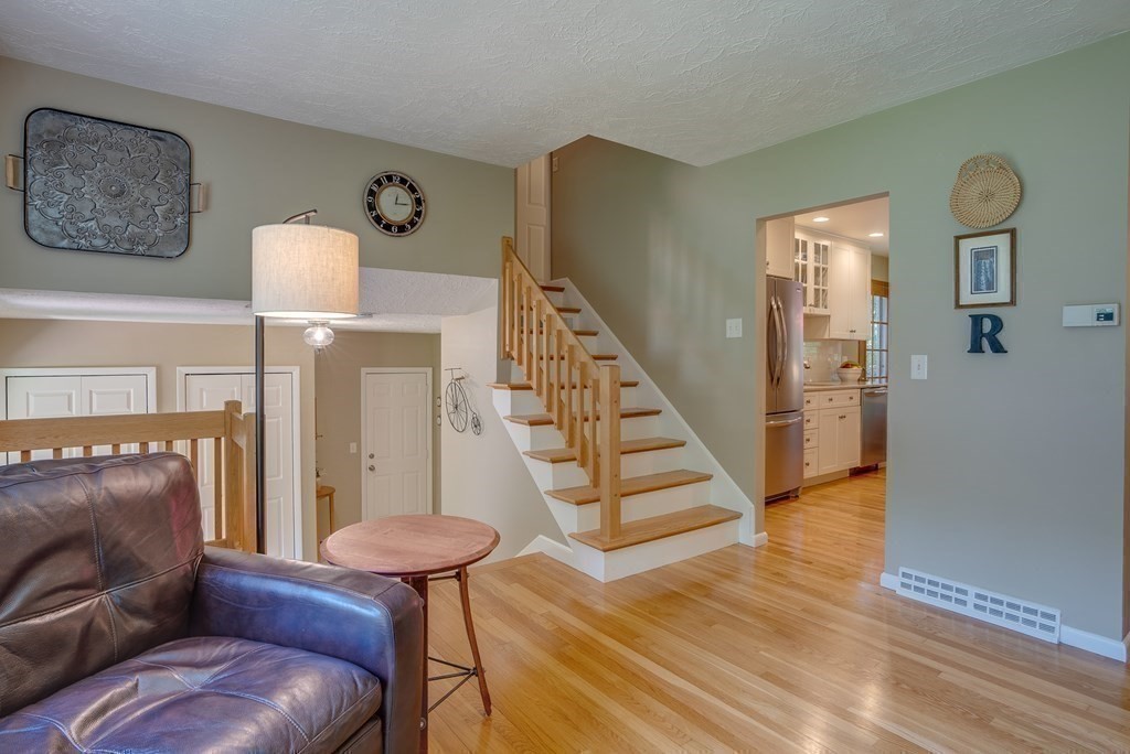 37 Long Meadow Road Chelmsford, MA 01824 - Photo 18 of 30 a living room with furniture and a wooden floor