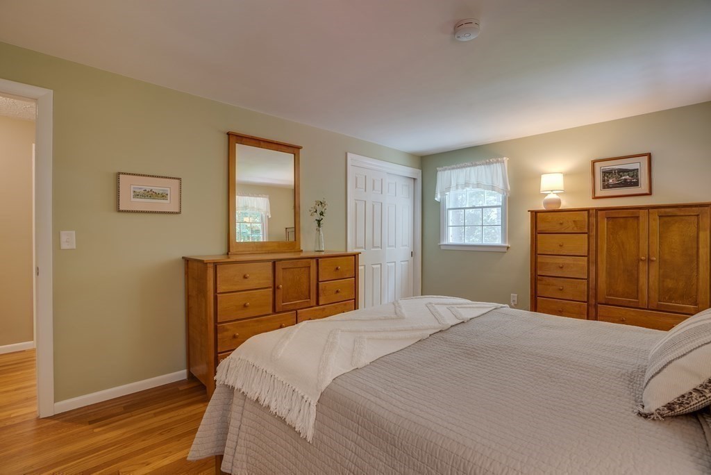 37 Long Meadow Road Chelmsford, MA 01824 - Photo 20 of 30 a bedroom with a bed and a closet