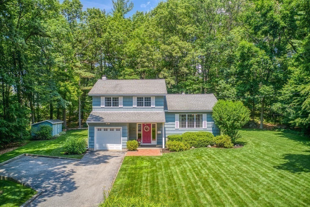37 Long Meadow Road Chelmsford, MA 01824 - Photo 2 of 30 a front view of a house with a yard