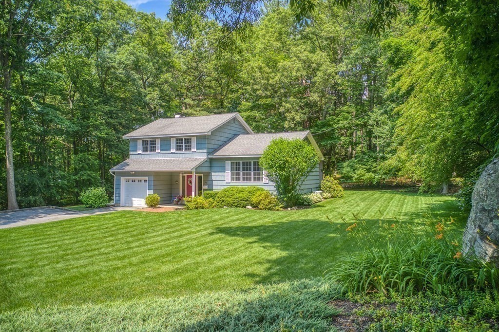 37 Long Meadow Road Chelmsford, MA 01824 - Photo 29 of 30 a front view of a house with a garden