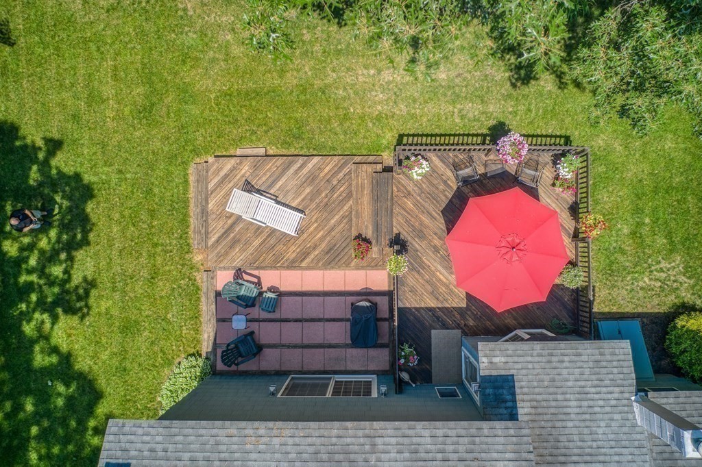 37 Long Meadow Road Chelmsford, MA 01824 - Photo 4 of 30 an aerial view of a house with a backyard