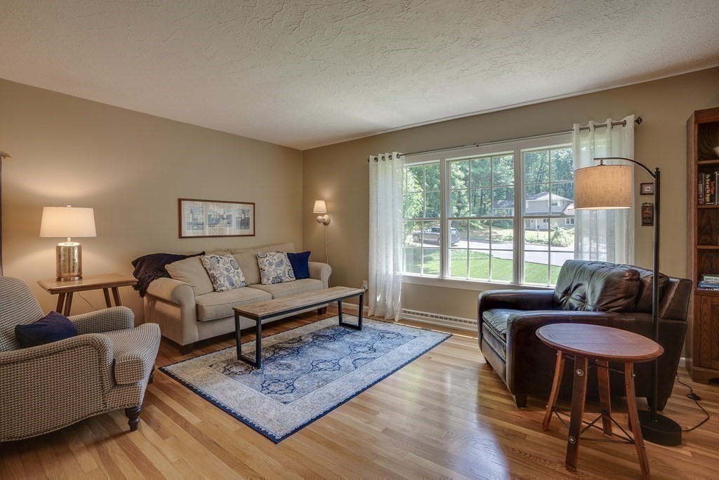 37 Long Meadow Road Chelmsford, MA 01824 - Photo 8 of 30 a living room with furniture and a large window
