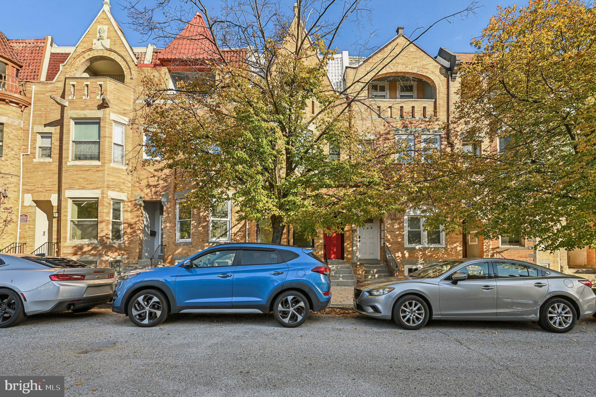 a view of a car in front of a house