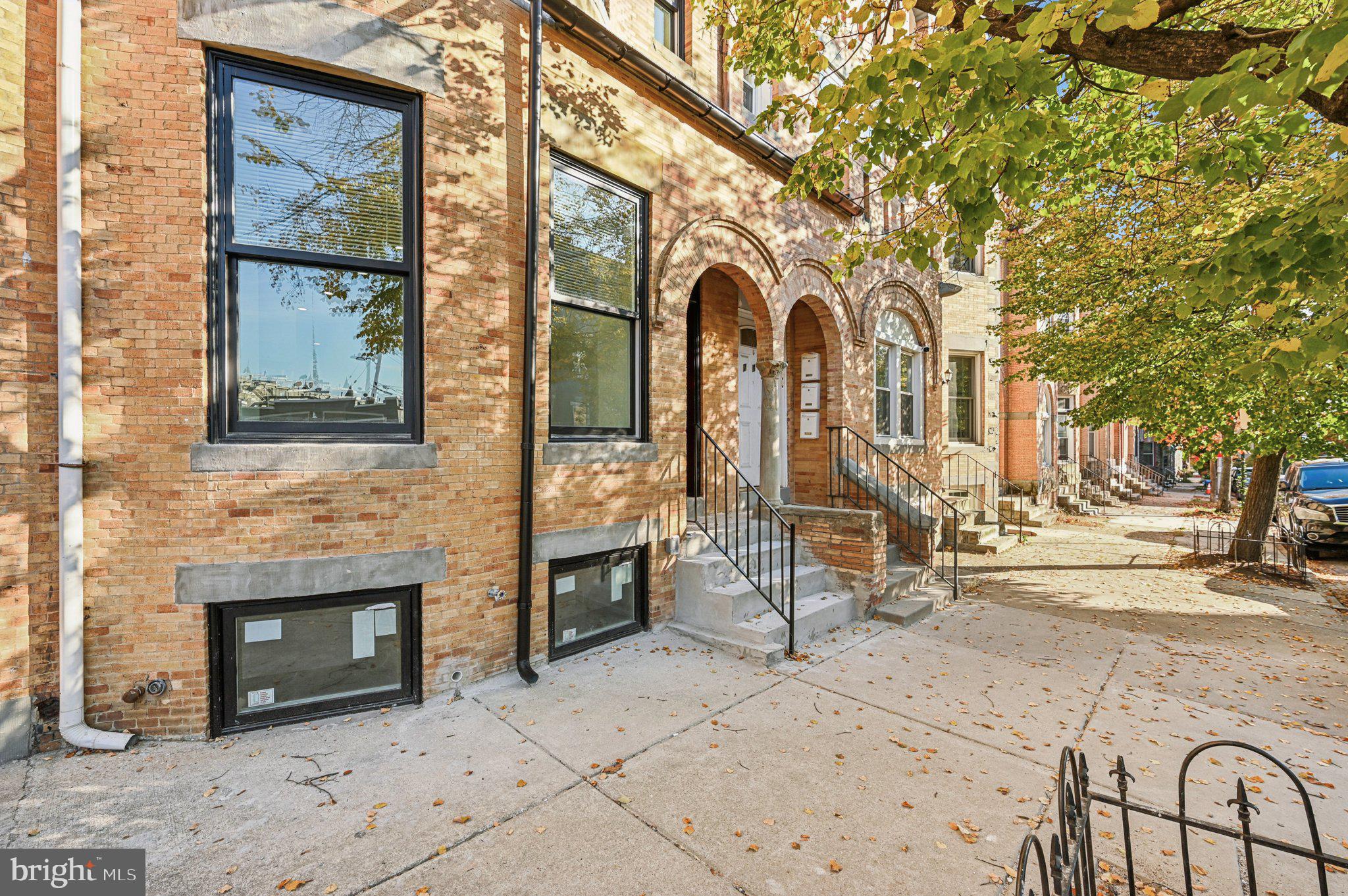 750 Reservoir Street, Unit A Baltimore, MD 21217 - Photo 2 of 23 a building with outdoor seating