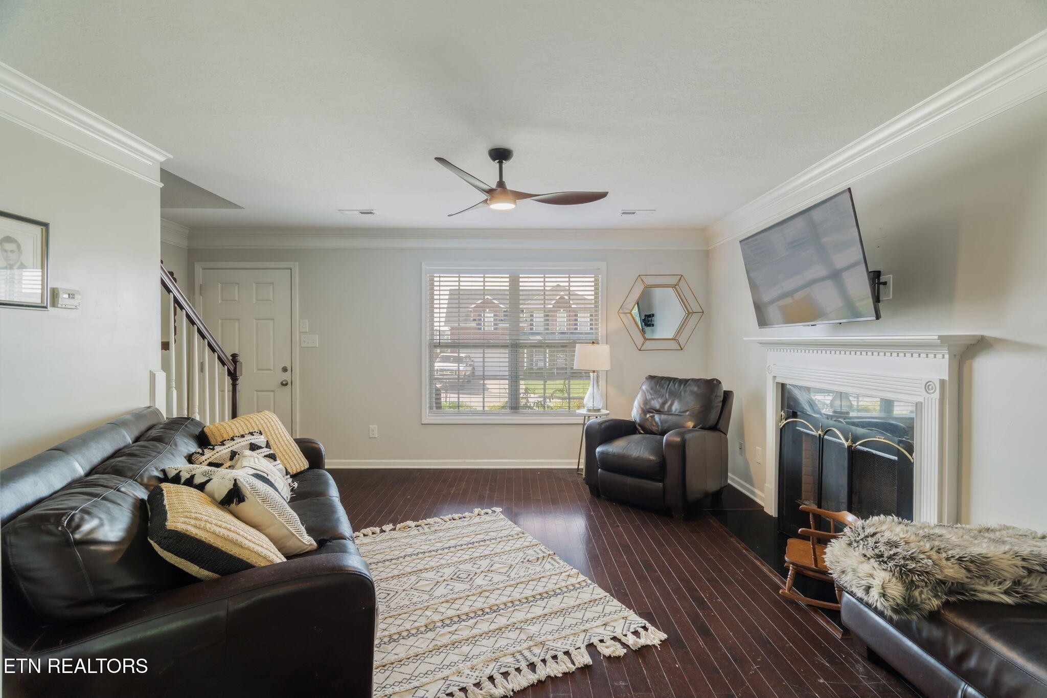 8431 Vessel Lane Powell, TN 37849 - Photo 11 of 46 a living room with furniture a fireplace and a large window
