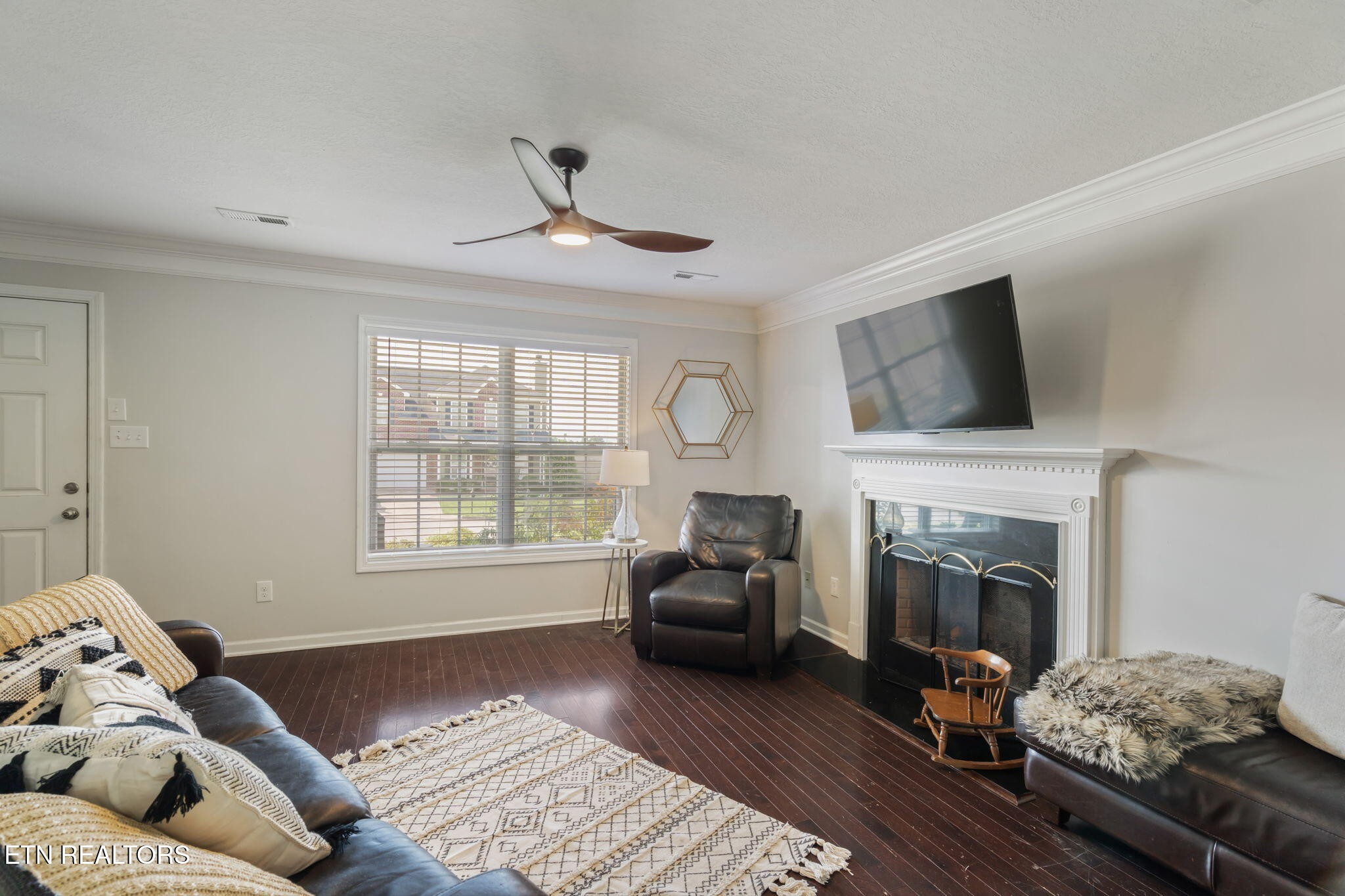 8431 Vessel Lane Powell, TN 37849 - Photo 12 of 46 a living room with furniture and a fireplace