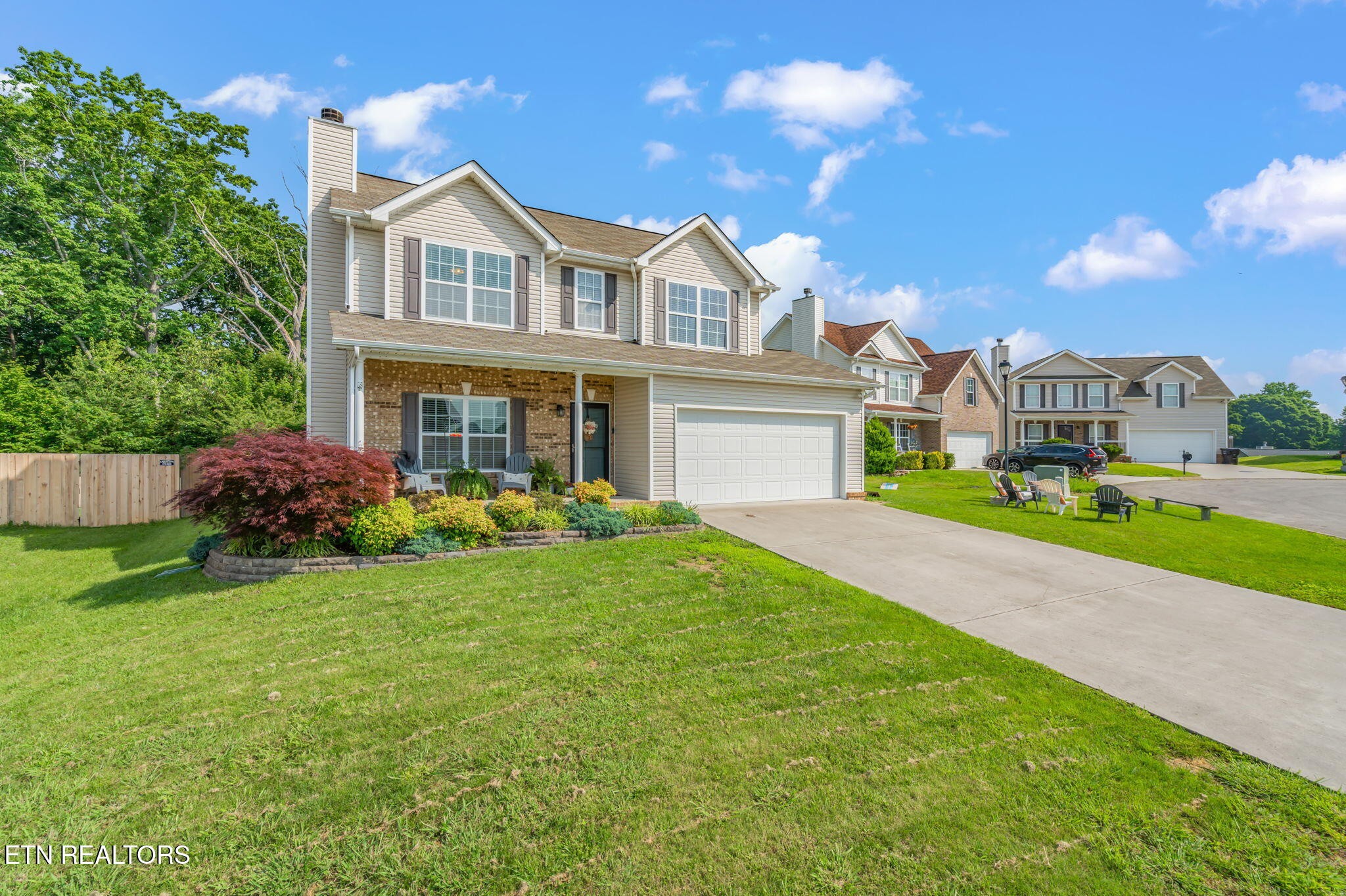 8431 Vessel Lane Powell, TN 37849 - Photo 2 of 46 a front view of a house with garden