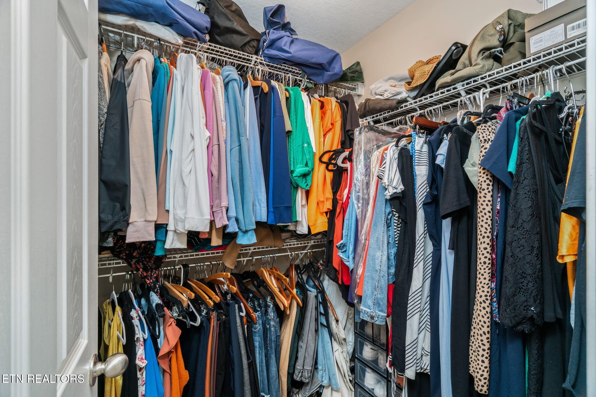 8431 Vessel Lane Powell, TN 37849 - Photo 28 of 46 a view of walk in closet with clothes