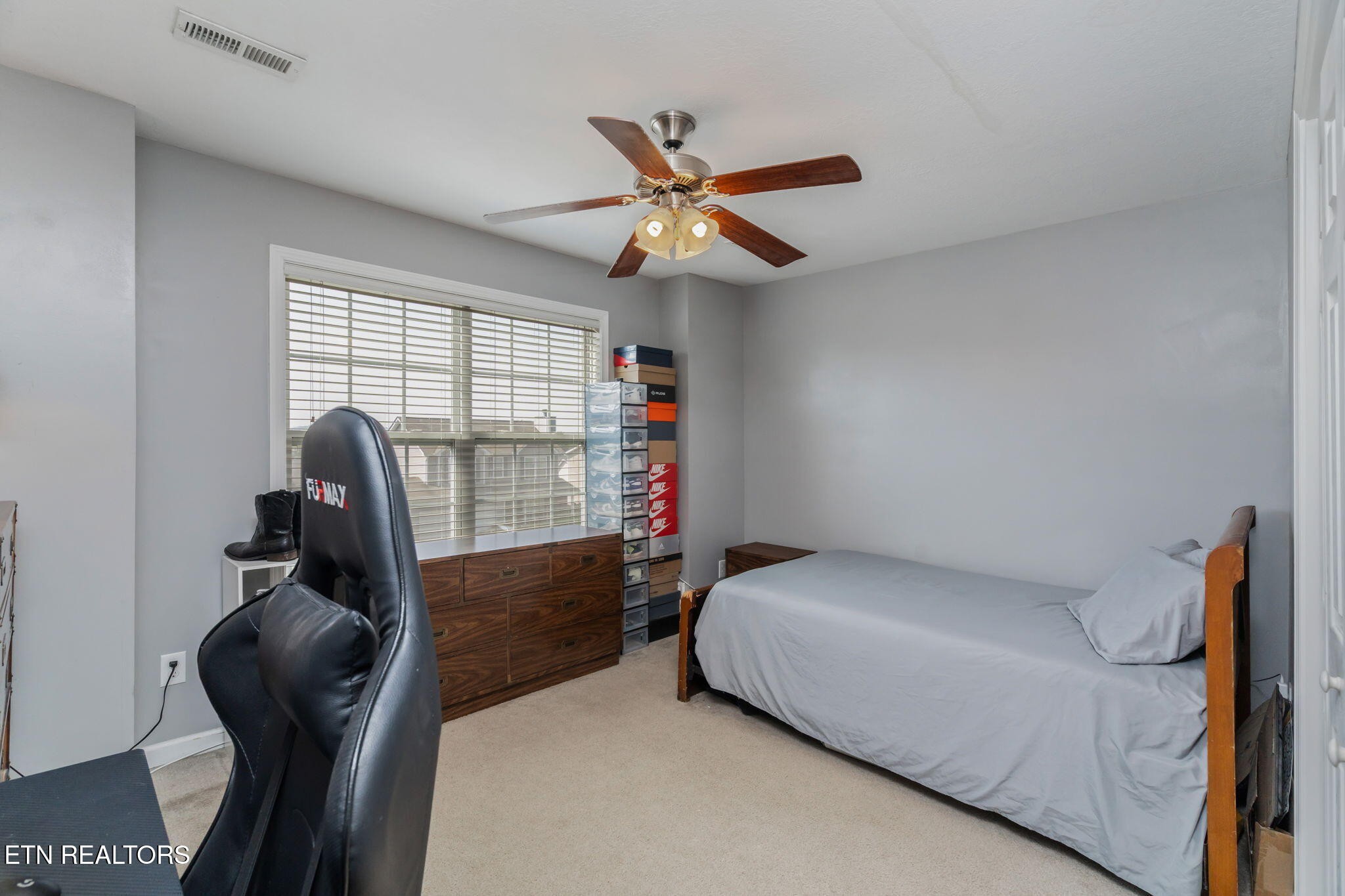 8431 Vessel Lane Powell, TN 37849 - Photo 31 of 46 a bedroom with furniture and a window