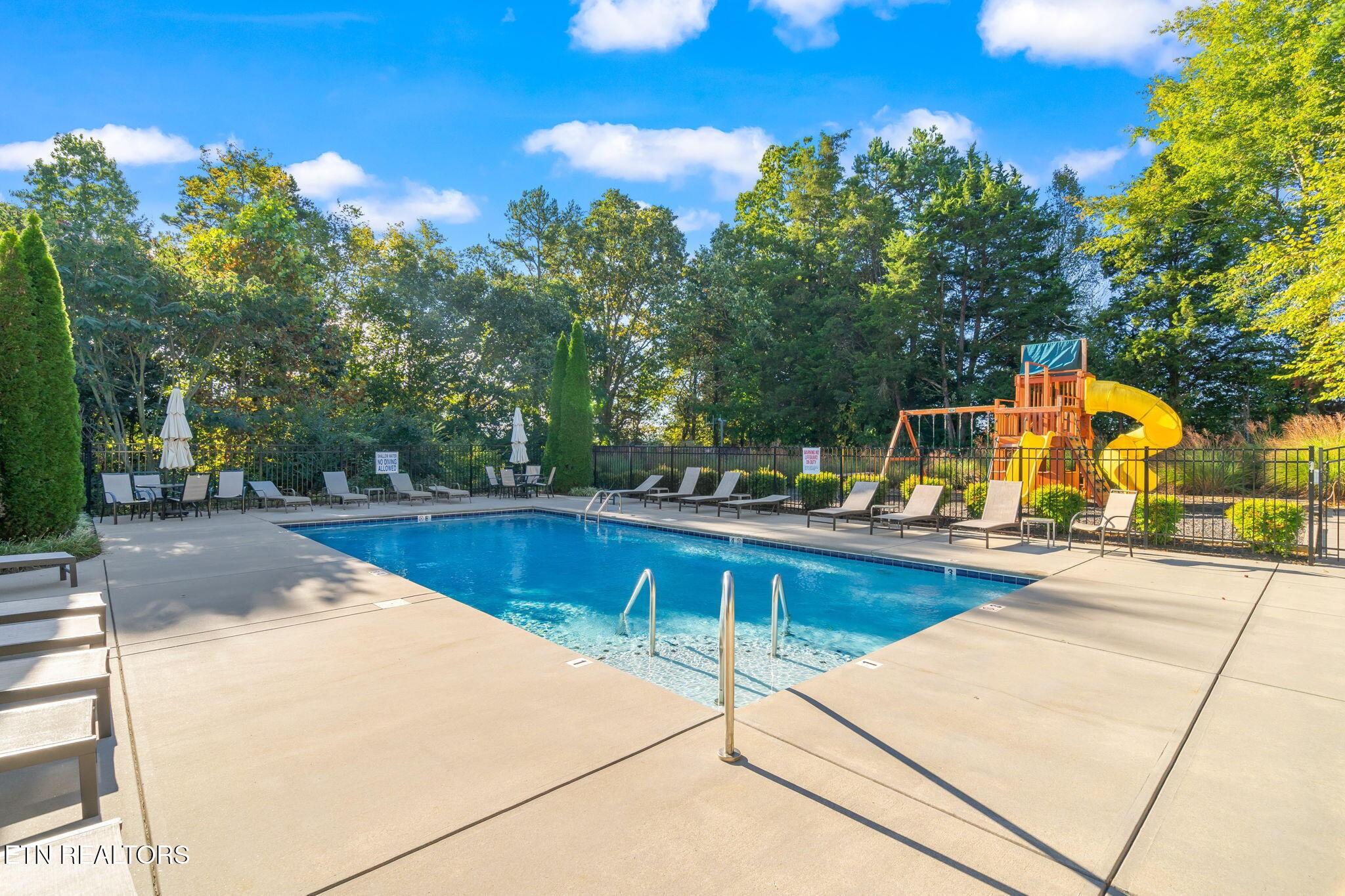 8431 Vessel Lane Powell, TN 37849 - Photo 45 of 46 a view of a swimming pool with a lounge chair