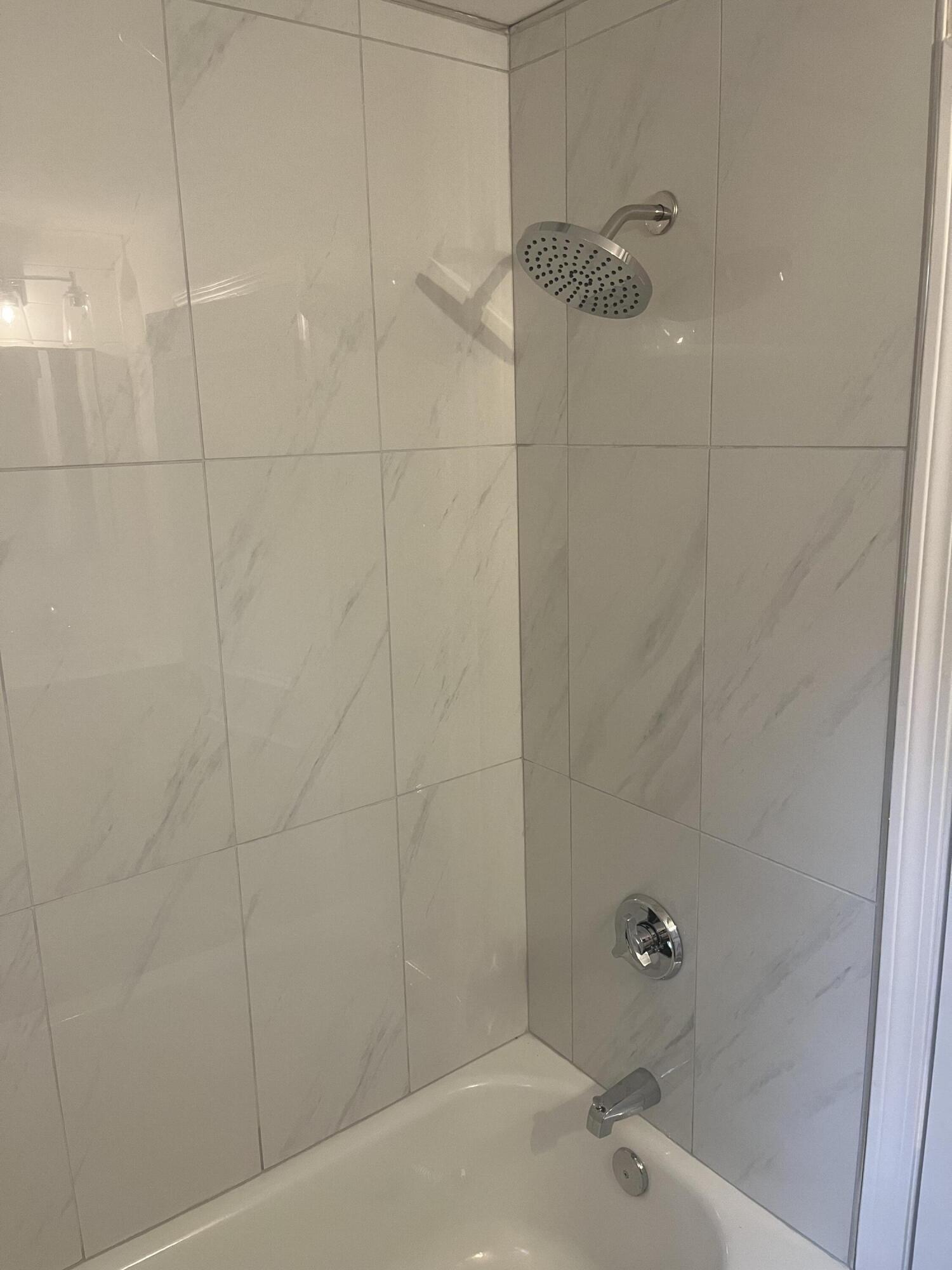 49 Burnham Street Barnstable, MA 02648 - Photo 12 of 17 a bathroom with a bathtub