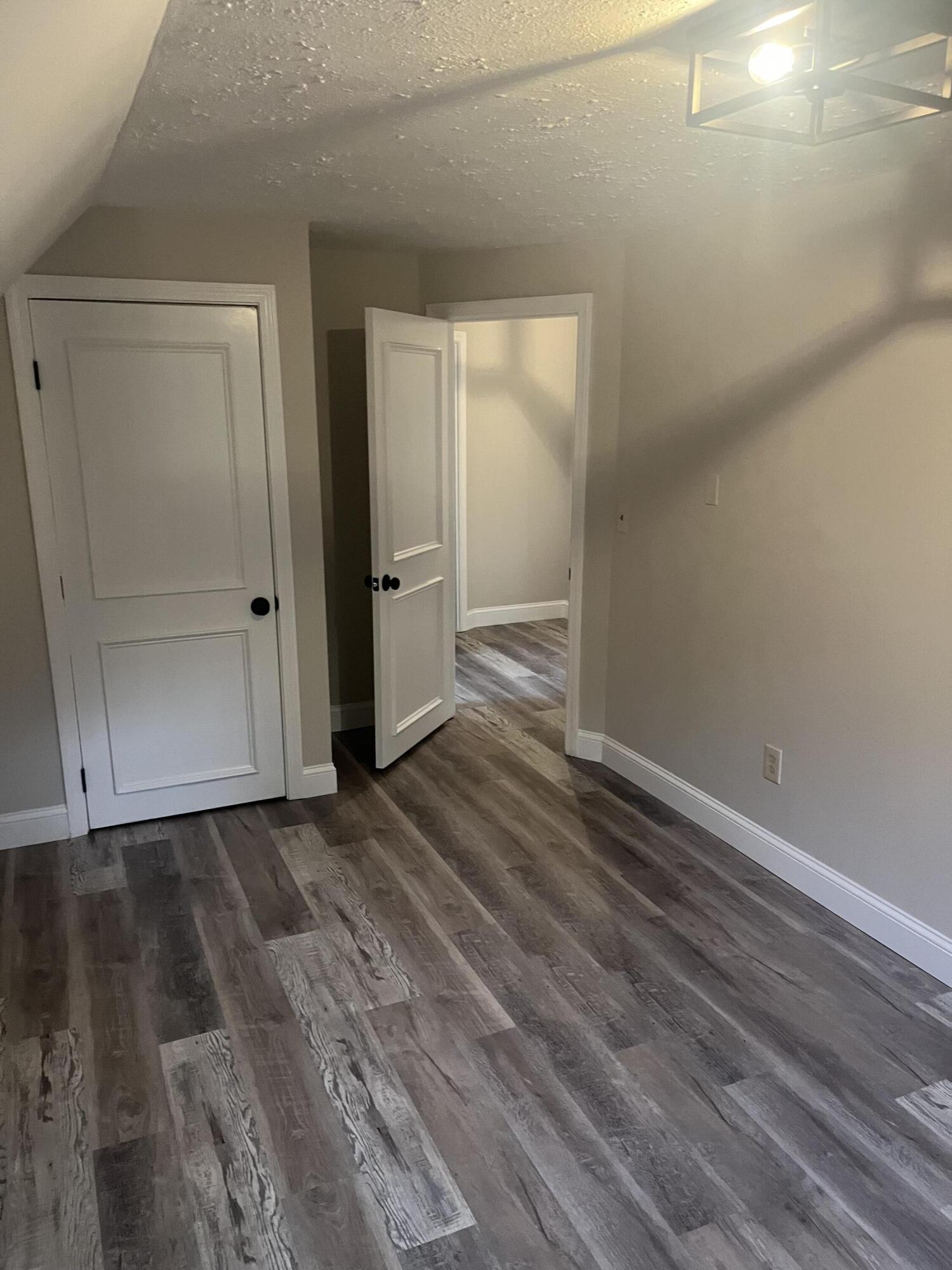 49 Burnham Street Barnstable, MA 02648 - Photo 15 of 17 a view of an empty room and wooden floor