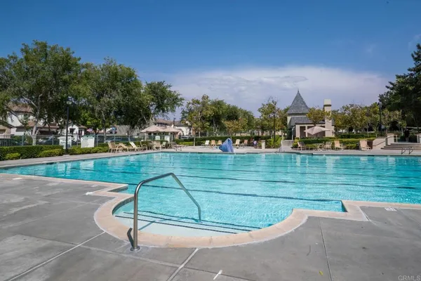 a potted plant is sitting on the side of a building