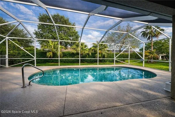 a view of outdoor space with swimming pool