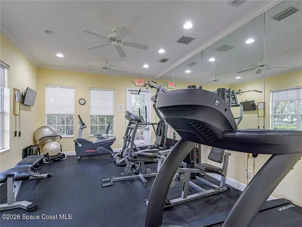 a view of a room with gym equipment