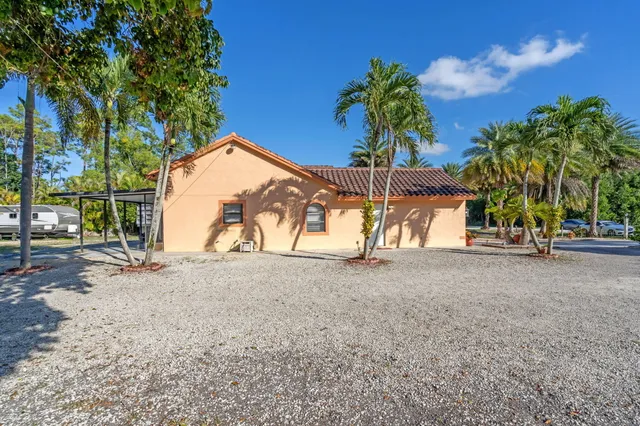 a view of a house with a street