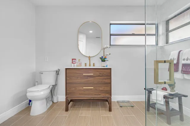 a bedroom with furniture and a fireplace
