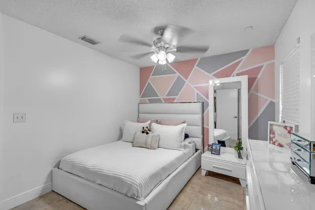 a kitchen with stainless steel appliances granite countertop a sink counter space and a granite counter tops