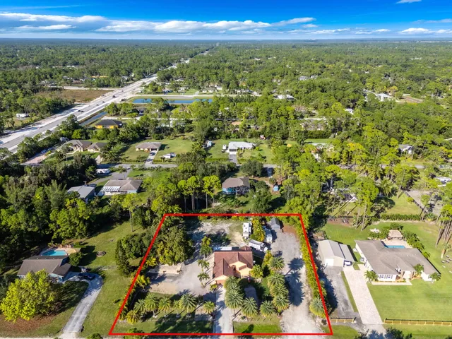 a view of a backyard of a house